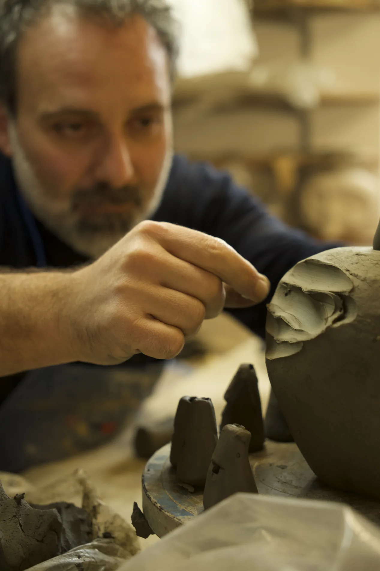 Detail of Salvatore Troiano’s hands at work